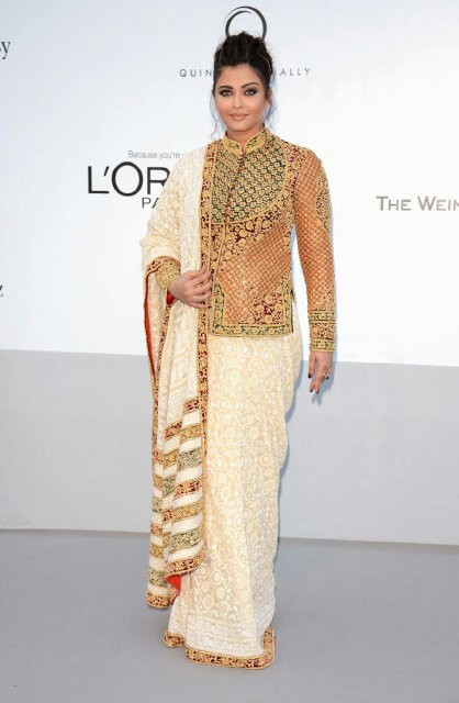 Aish in an ivory saree and golden long choli – 2012