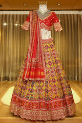 Yellow Silk Traditional Patola Lehenga with Sequin Zardosi Scallop Border