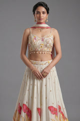 Close-up of authentic shell detailing and hand-sewn beads on the Off White Chinon Silk Lehenga