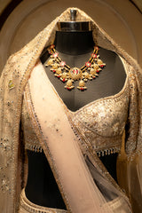 Mirror work and 3D floral accents on the Off White Silk Flamingo Lehenga
