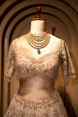 Ethereal sheer net dupatta details of the Ivory White Silk Bridal Lehenga