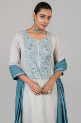Close up of the vibrant contrast embroidery on Off White Linen Kurti Set