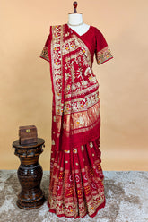 Maroon Gaji Silk Traditional Bandhej Checks Gharchola Saree with Embroidery and Peacock Motif - maroon silk saree bandhej