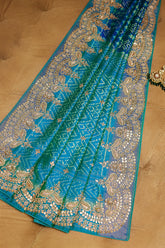 Turquoise Blue Silk Patola Saree with Zardosi Sequin Worked Scallop Border - blue silk saree patola