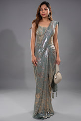Close-up of tonal sequins and zardosi work on the Mint Blue Lycra Net Sequinned Saree