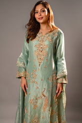 Close-up of traditional Zardosi and shimmering sequins on the Turquoise Blue Organza Designer Handworked Suit
