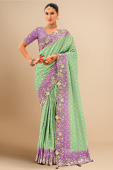 Sea Green Silk Paisley Motif Saree with Sequin Embroidered Contrast Border