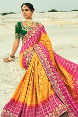 Yellow and Pink Georgette Traditional Bandhej Saree with HandWork