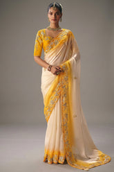 Ivory and Yellow Viscose Chiffon Saree With Heavy Zari Embroidered Border