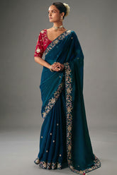 Teal Blue Viscose Chiffon Saree With Embroidered Border And Buti Work