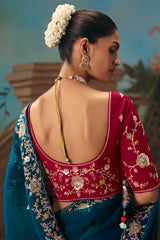 Teal Blue Viscose Chiffon Saree With Embroidered Border And Buti Work