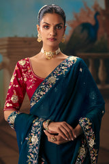 Teal Blue Viscose Chiffon Saree With Embroidered Border And Buti Work