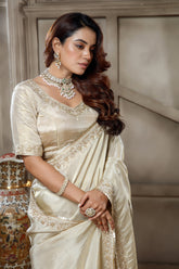 Ivory White Tissue Dola Silk Solid Saree with Readymade Blouse and Beaded Work Border - white silk saree