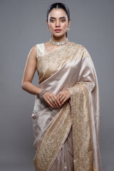 Close-up of intricate Cutdana and delicate beadwork on the Silver and Golden Tissue Silk Saree