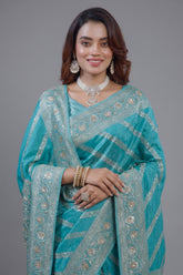 Close-up of intricate beaded details and gota work on the Sky Blue Dola Silk Lehehriya Saree