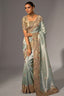 Pista Green Madhurai Silk Saree featuring Ornate Zardosi & Cutdana Hand Art