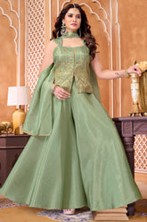 Model wearing Light Pista Green Tissue Woven Palazzo Suit with Woven Applique Work and Flare Pants