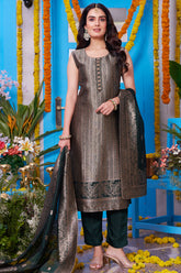 Model wearing Dark Olive Green Brocade Silk Straight Cut Suit with Matching Trousers