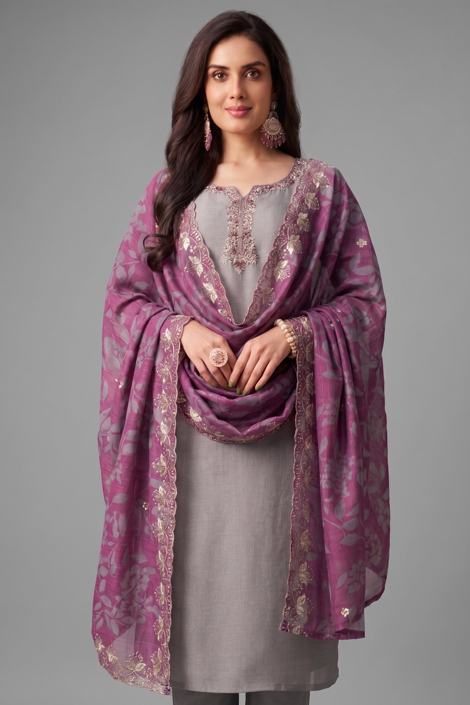 Close up of bead and thread embroidery work on light grey art silk suit