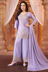 Model wearing lilac purple chinon silk woven embroidered palazzo suit with dupatta`
