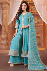 Model wearing sky blue chinon chiffon silk embroidered slit cut palazzo suit