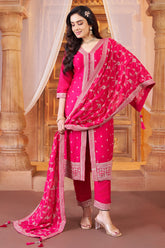 Model wearing festive rani pink art silk sequin embroidered straight cut suit