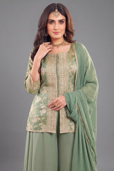 Close-up of woven patterns on Green Tissue Woven Palazzo Suit