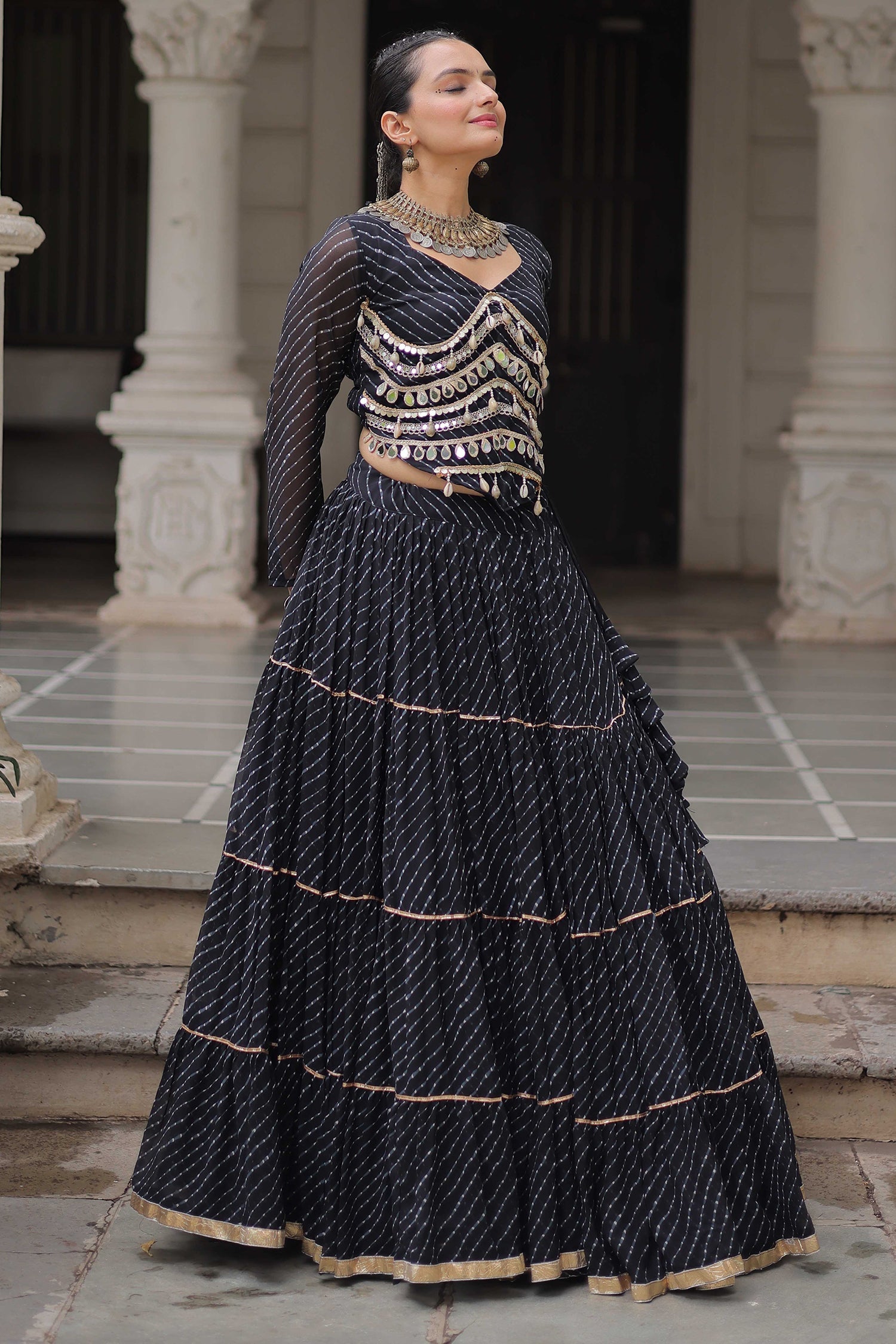 Black Flared Georgette Chaniya Choli with Leheriya Print Work