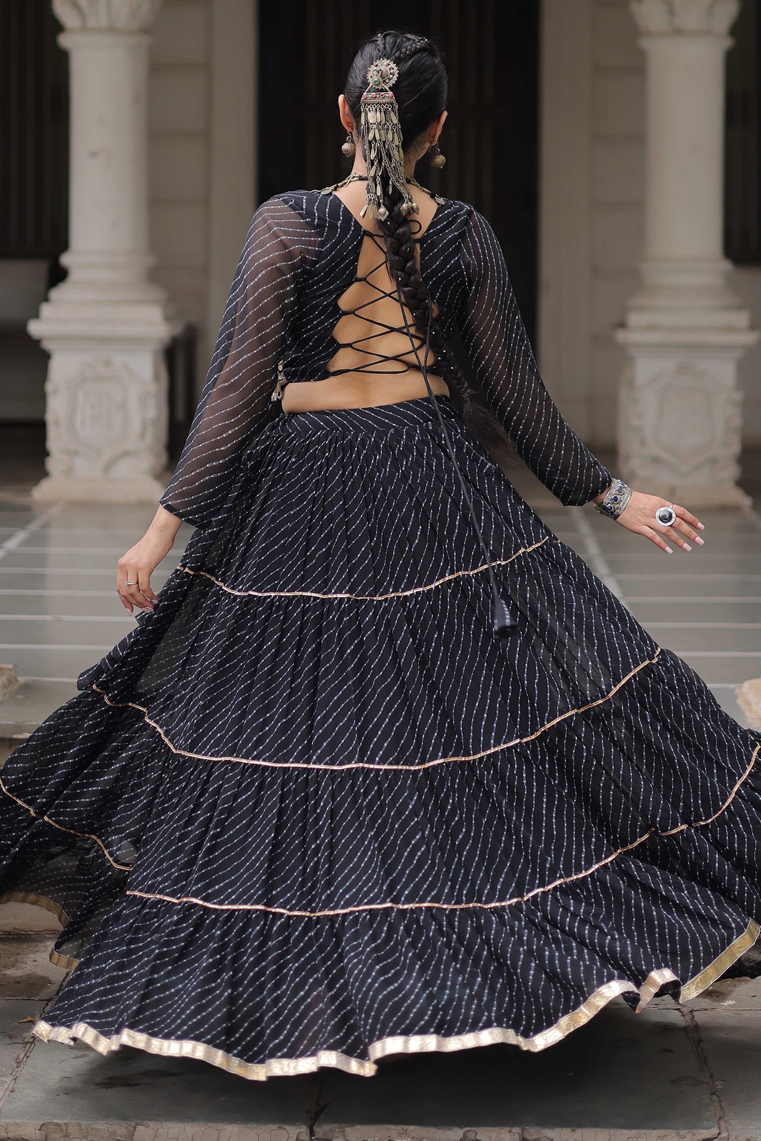 Black Flared Georgette Chaniya Choli with Leheriya Print Work