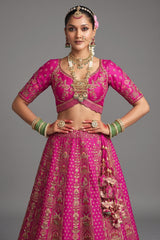 Rani Pink Silk Heavy Worked Bridal Lehenga - pink silk saree