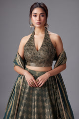 Dark Green Tissue Zari Woven Lehenga with Handworked Halter Neck Blouse
