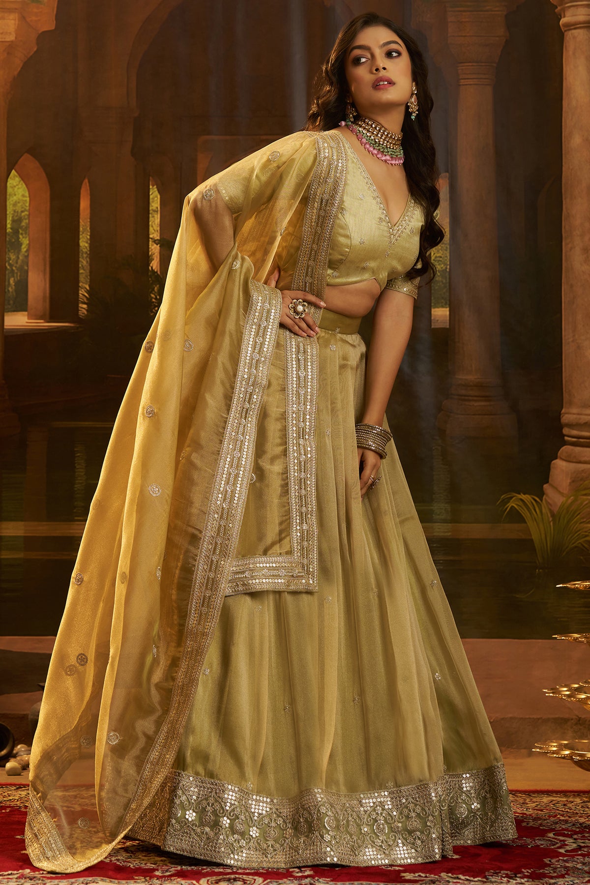 Designer Muted Pistachio Gold Crepe Lehenga with Sequins Border for grand celebratory events