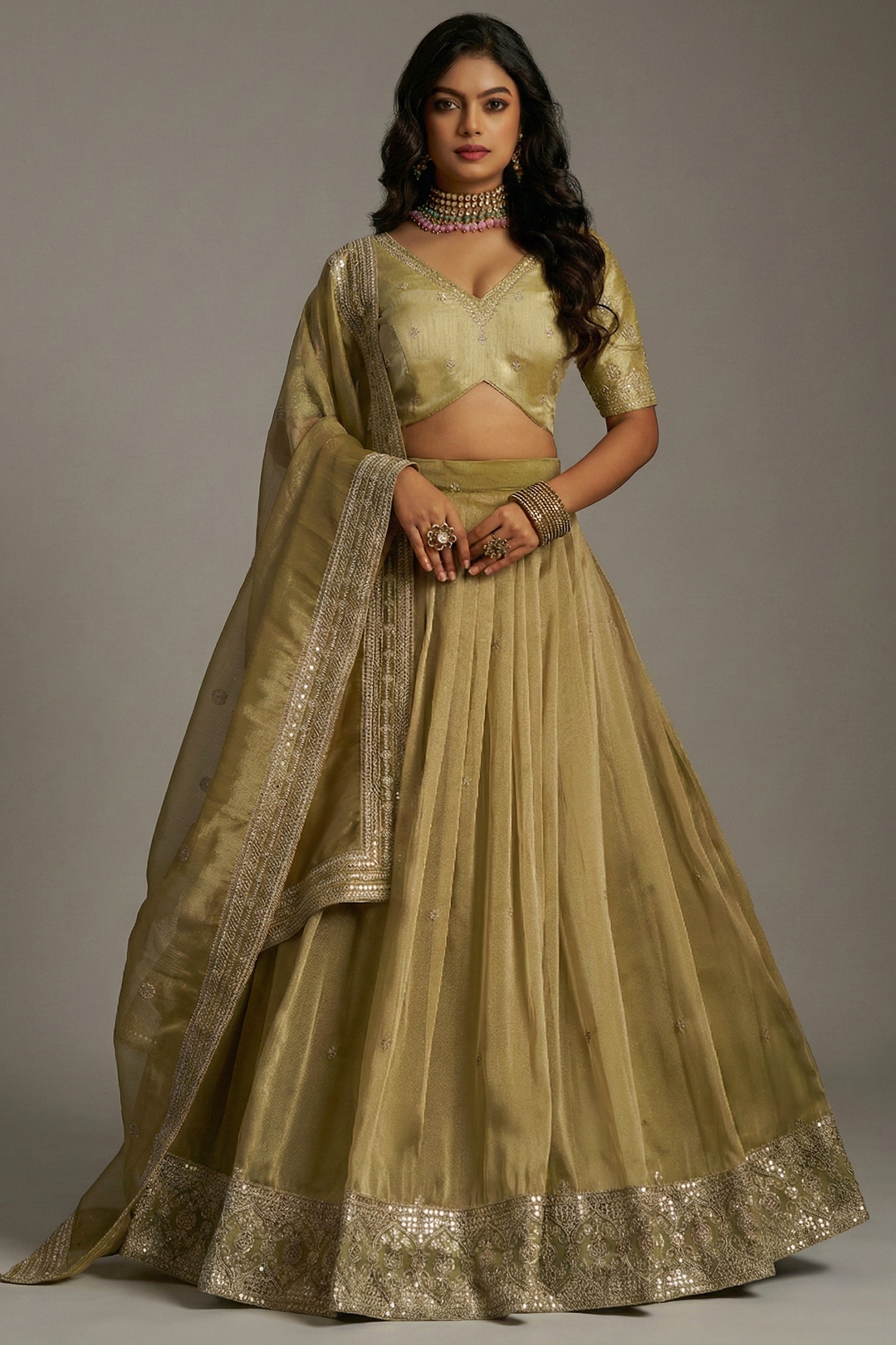 Muted Pistachio Gold Crepe Lehenga with Sequins Border - Front View