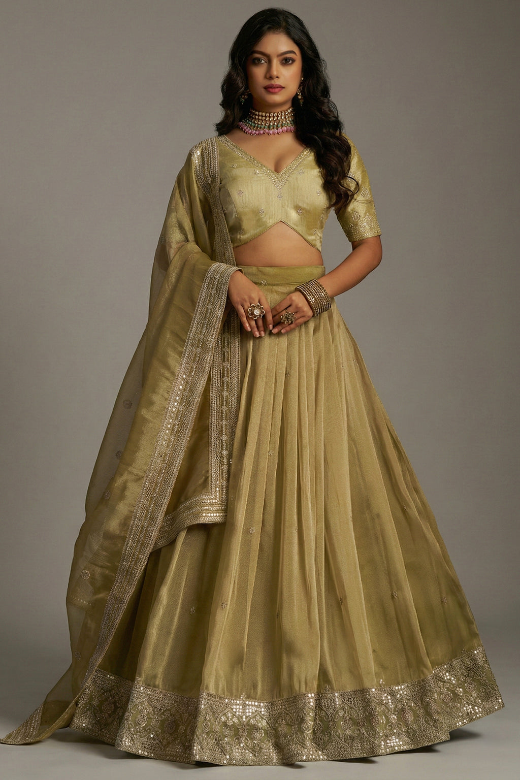 Muted Pistachio Gold Crepe Lehenga with Sequins Border - Front View