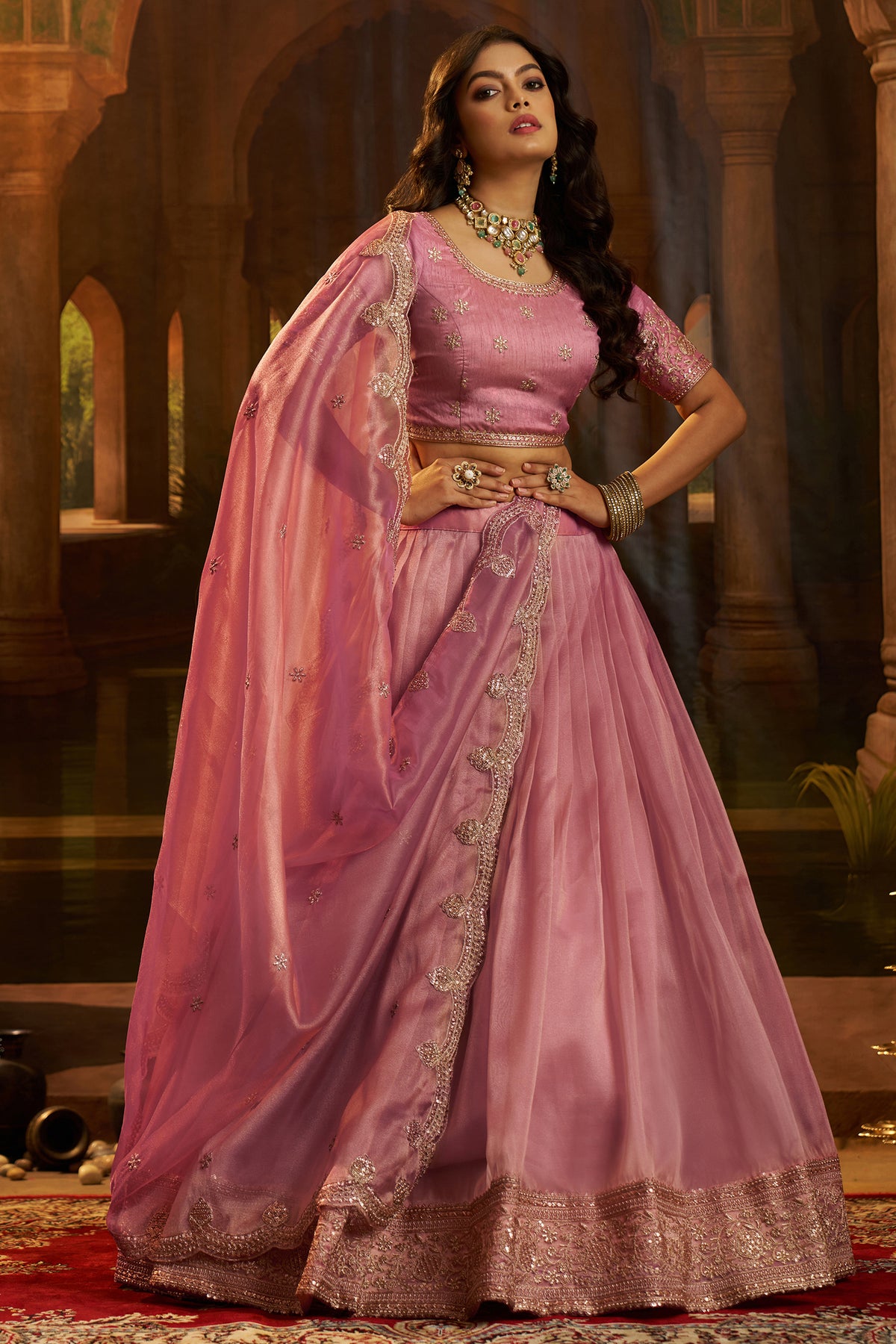 Dusty Rose Pink Organza Lehenga featuring a majestic and structured drape