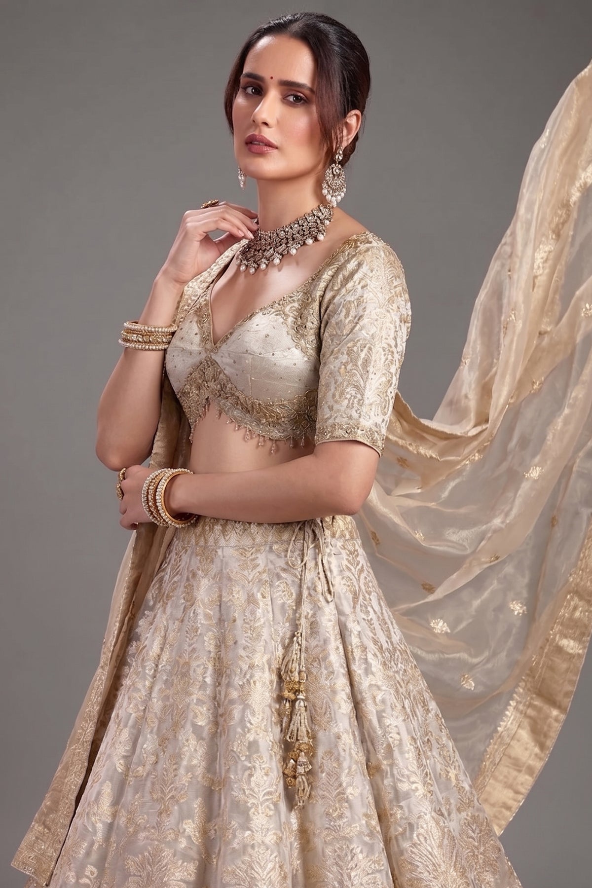 Ivory White and Golden Tissue Silk Floral Woven Lehenga - gold silk saree