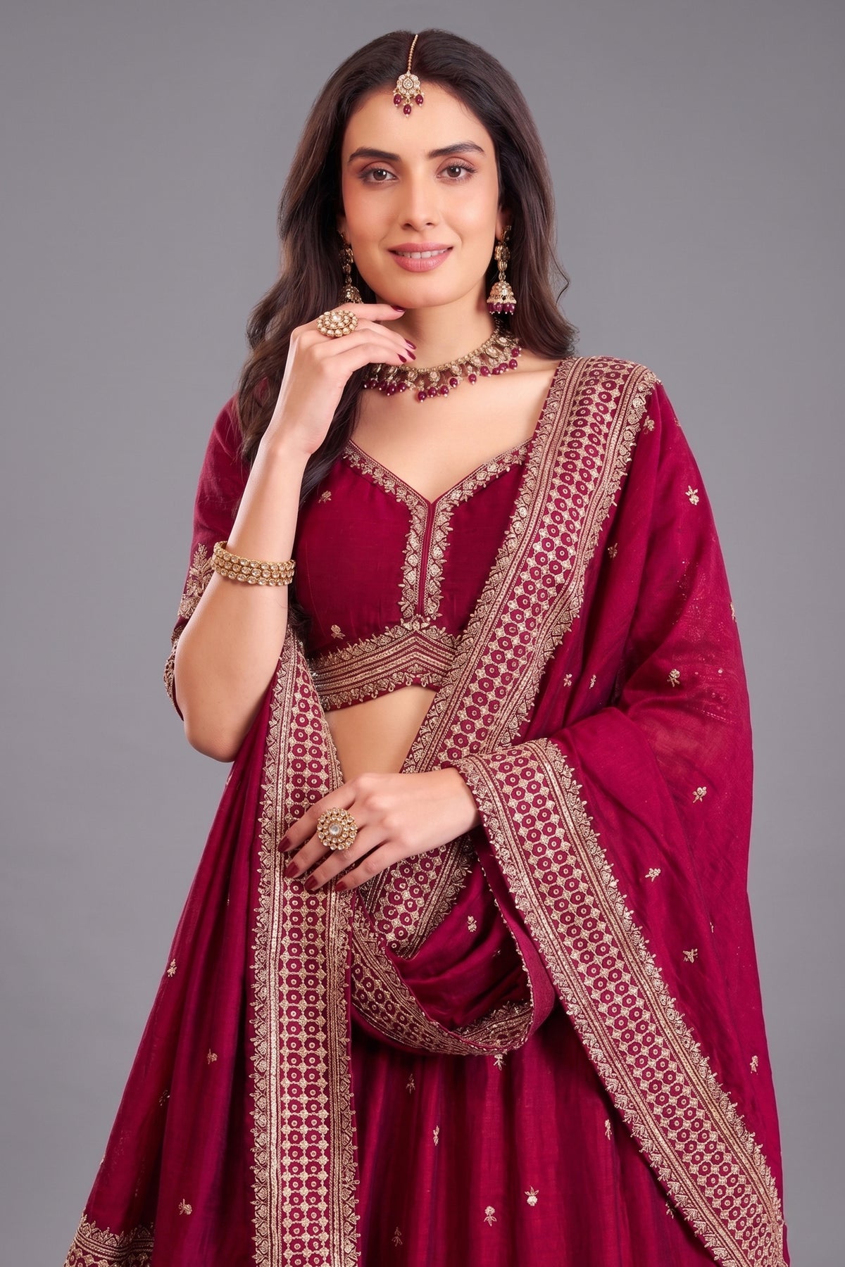 Wine art silk sequin embroidered lehenga back view with heavy embroidery detail