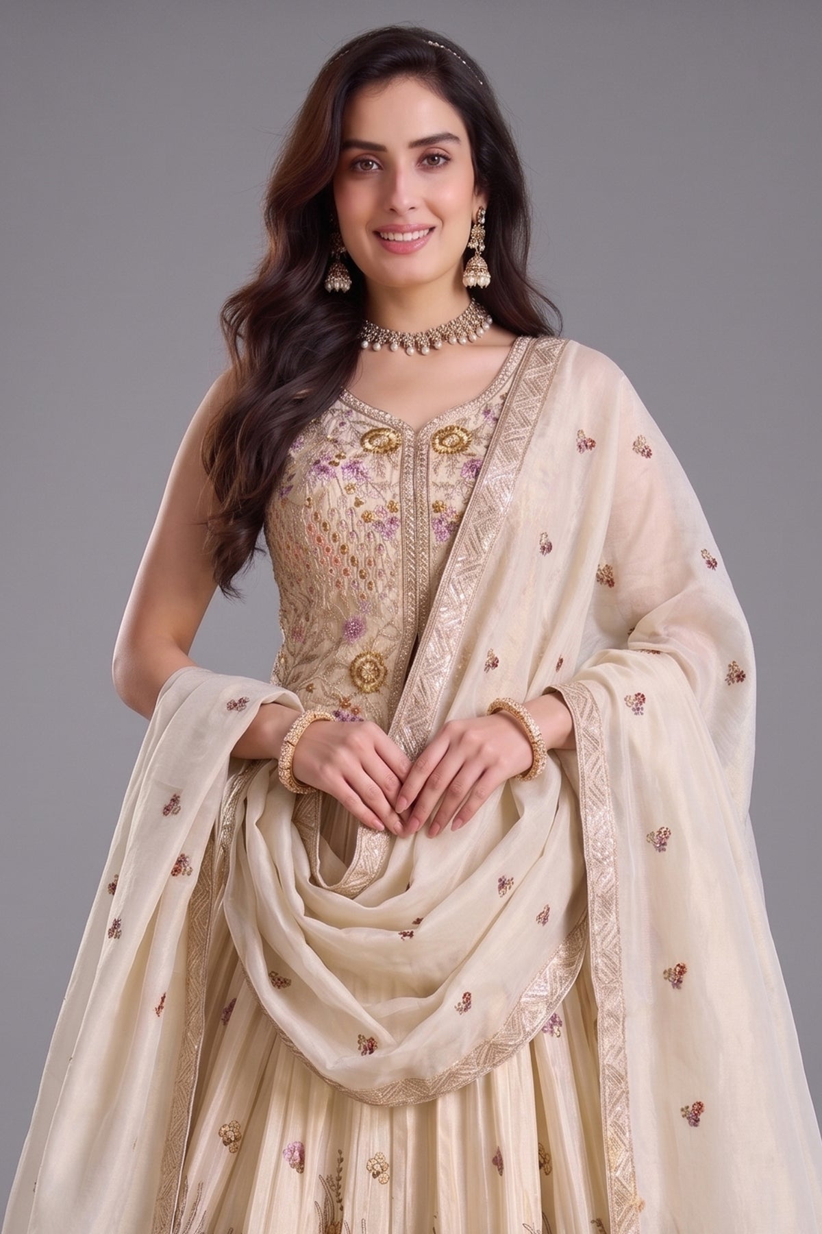 Cream chinon embroidered lehenga - back view with Resham work