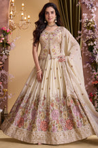 Cream chinon embroidered lehenga full-length view with long peplum blouse