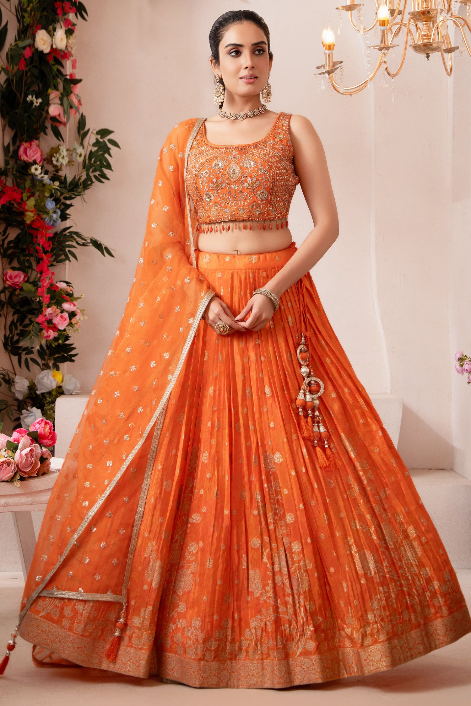 Elegant orange organza woven pleated lehenga traditional Indian attire