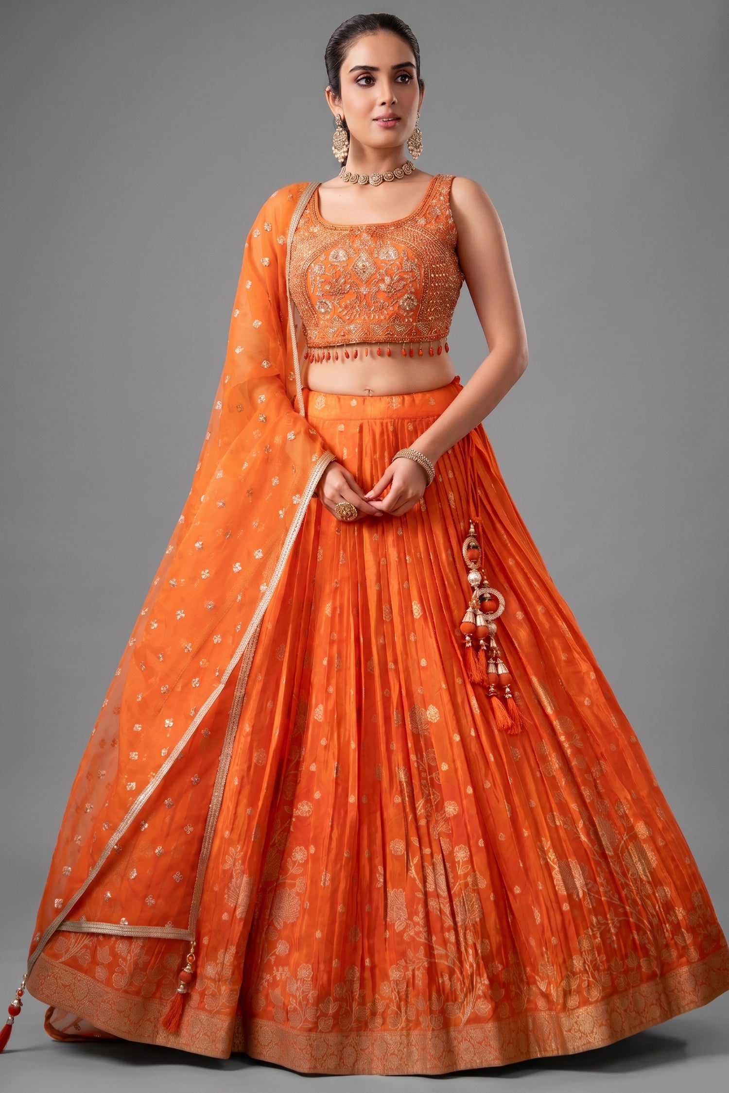 Orange organza woven pleated lehenga choli set for ethnic wear
