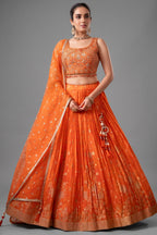 Orange organza woven pleated lehenga choli set for ethnic wear