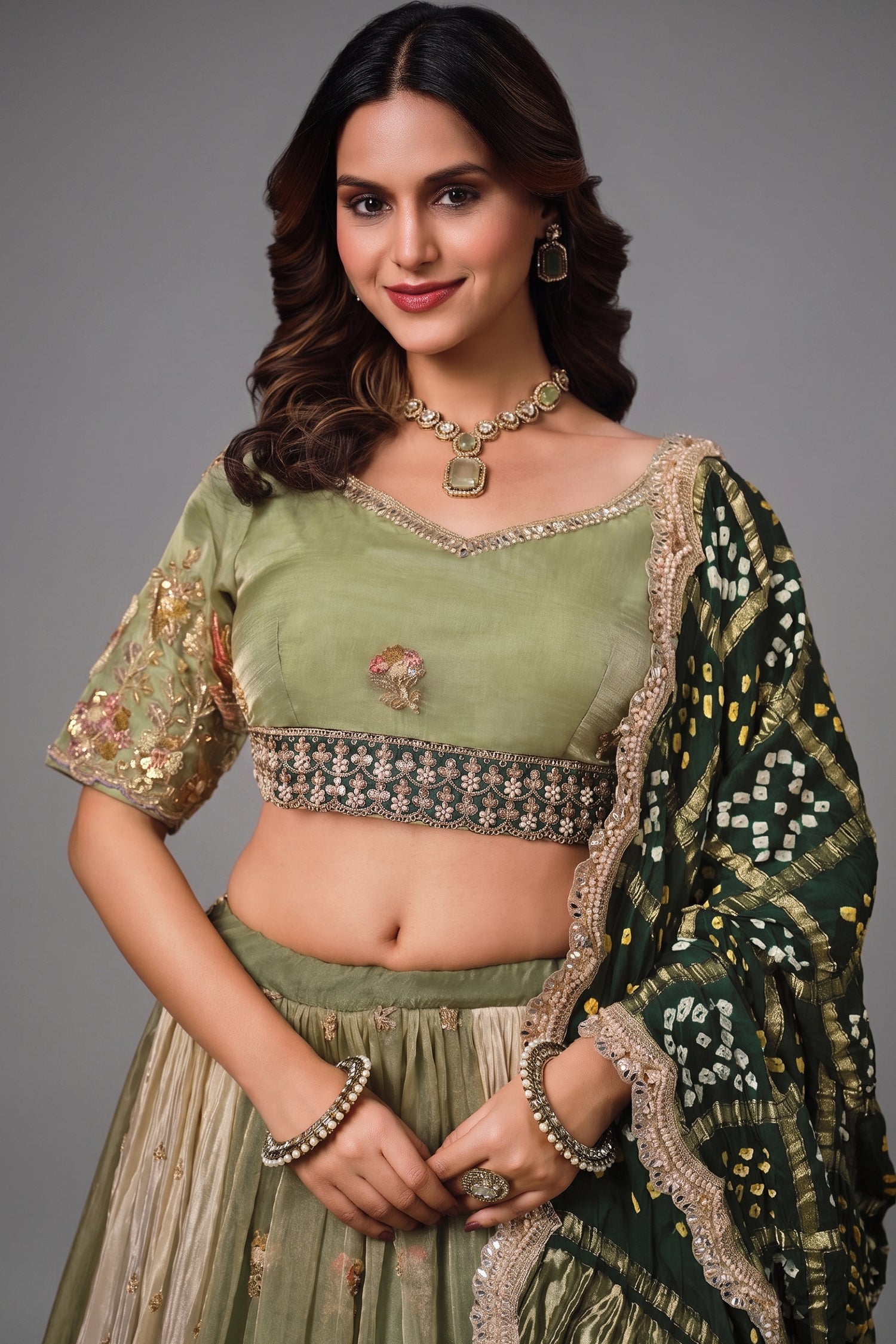 Sage Green Glass Tissue Lehenga Choli with Green Bandhej Dupatta Secondary image