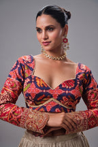 Cream and Gold Tissue Lehenga with Patola Choli and Rust Red Embroidered Dupatta