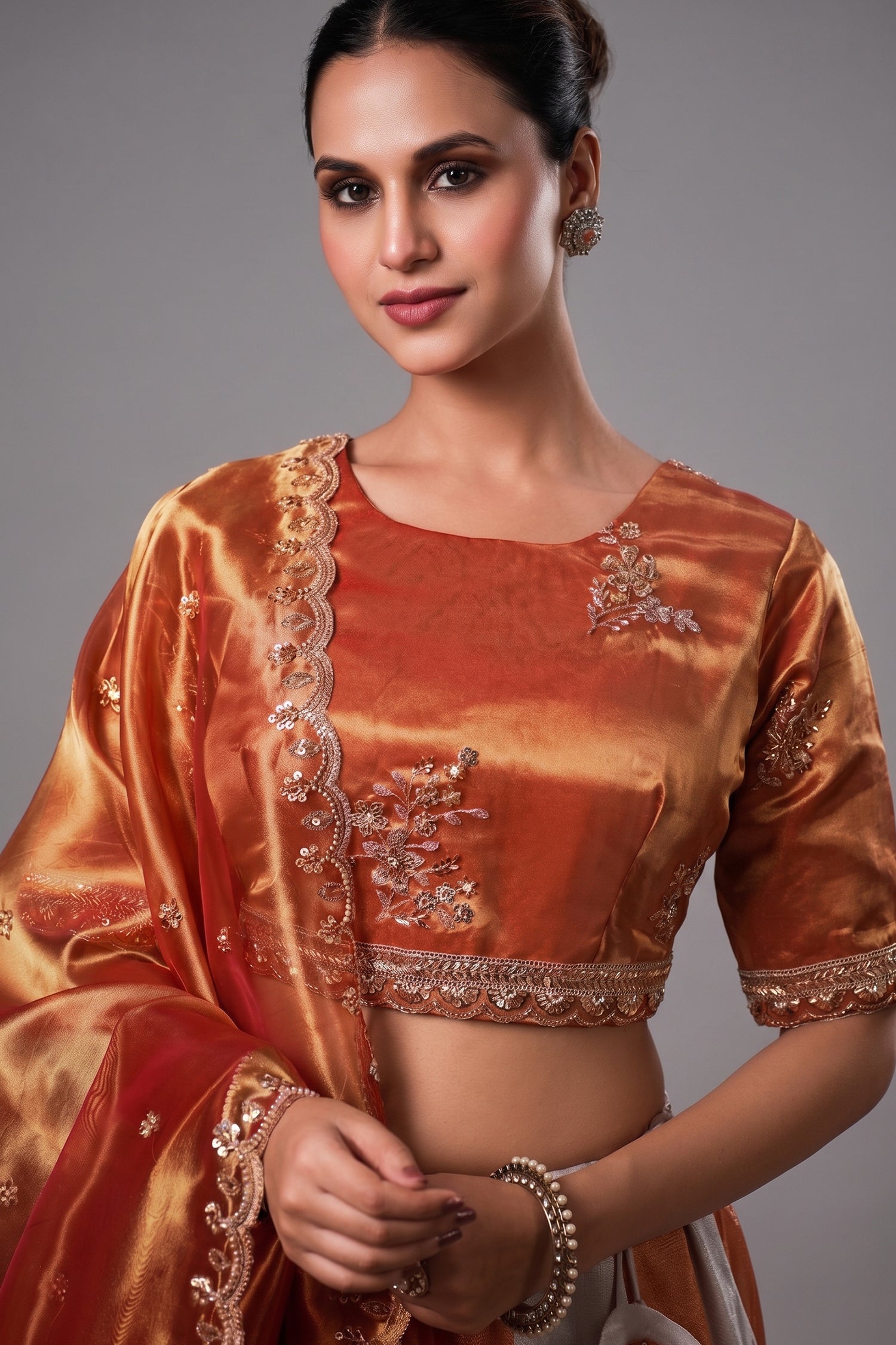 Grey and Orange Panelled Tissue Lehenga with Copper Tissue Border Dupatta Secondary image
