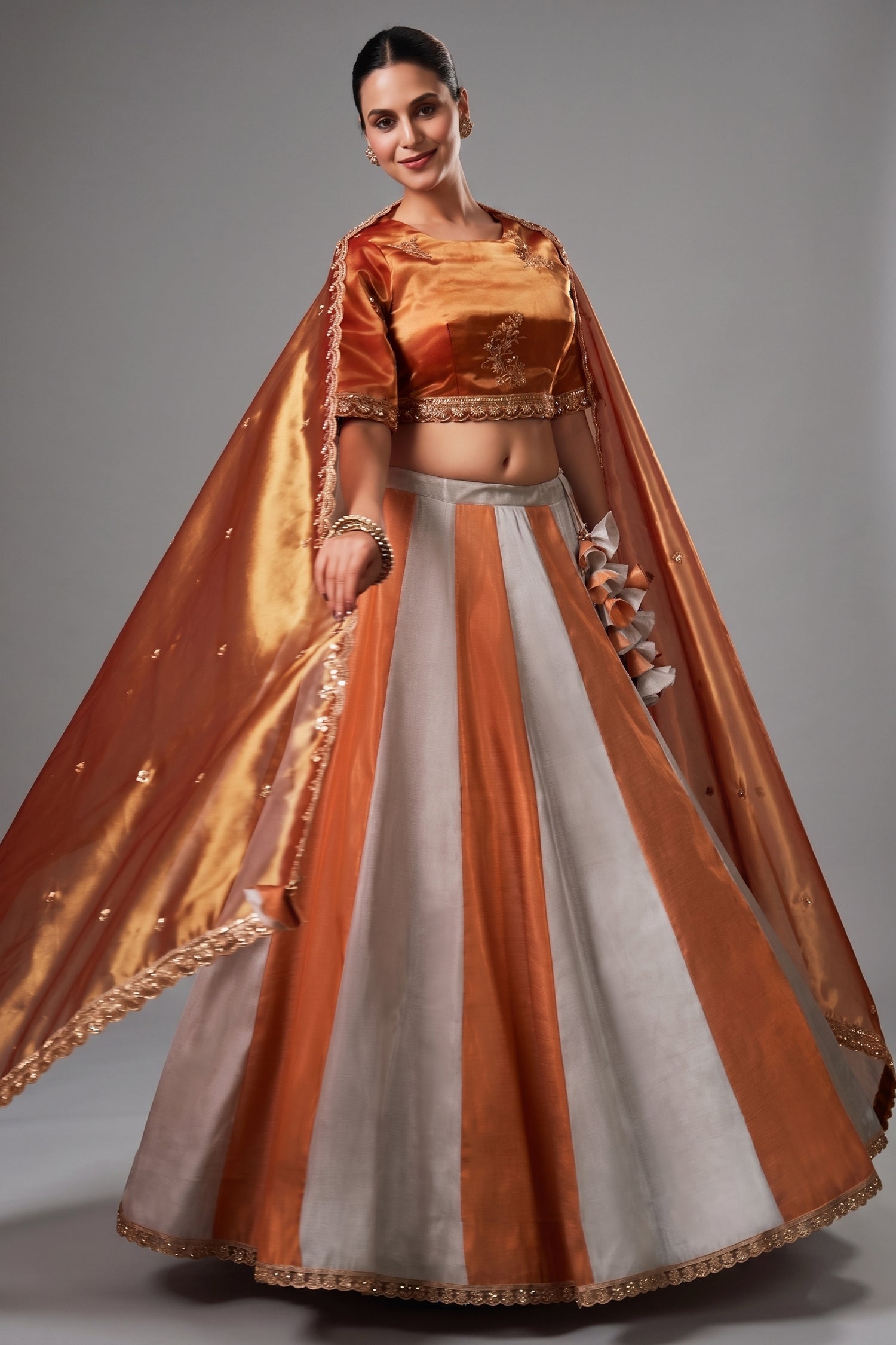 Grey and Orange Panelled Tissue Lehenga with Copper Tissue Border Dupatta