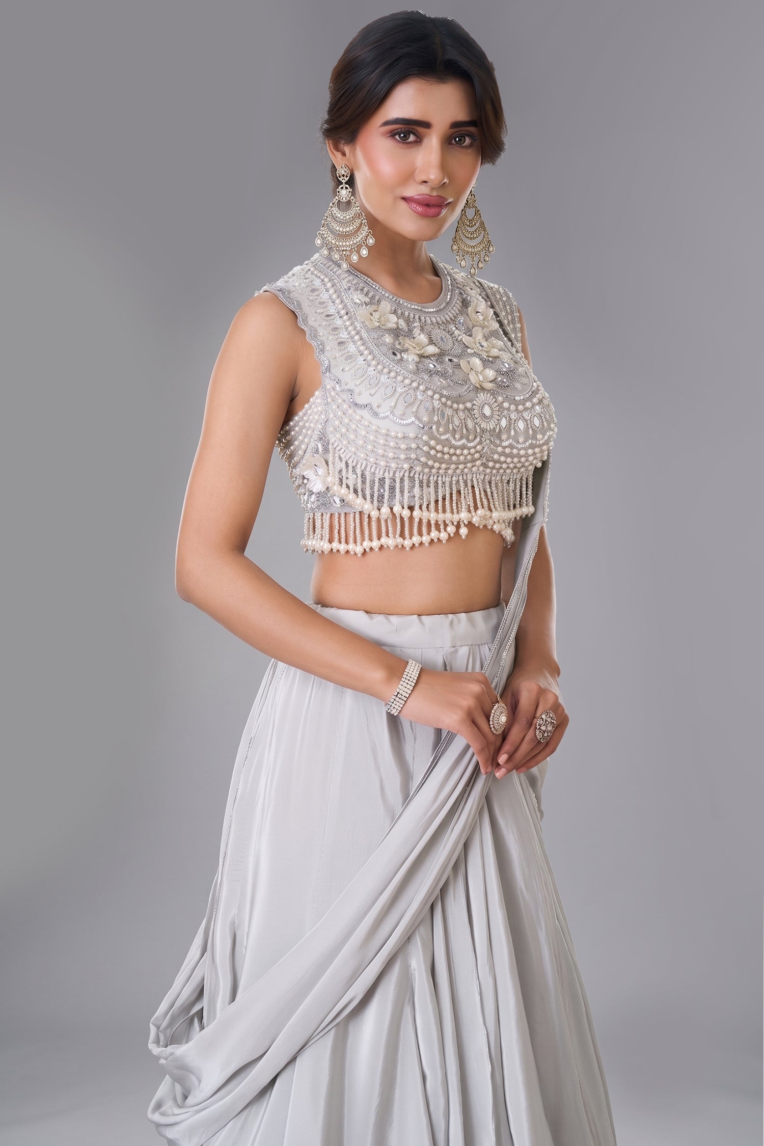 Ivory White Pre-Draped Lehenga featuring heavily Embroidered Pearl Fringe Blouse with Attached Dupatta Secondary image