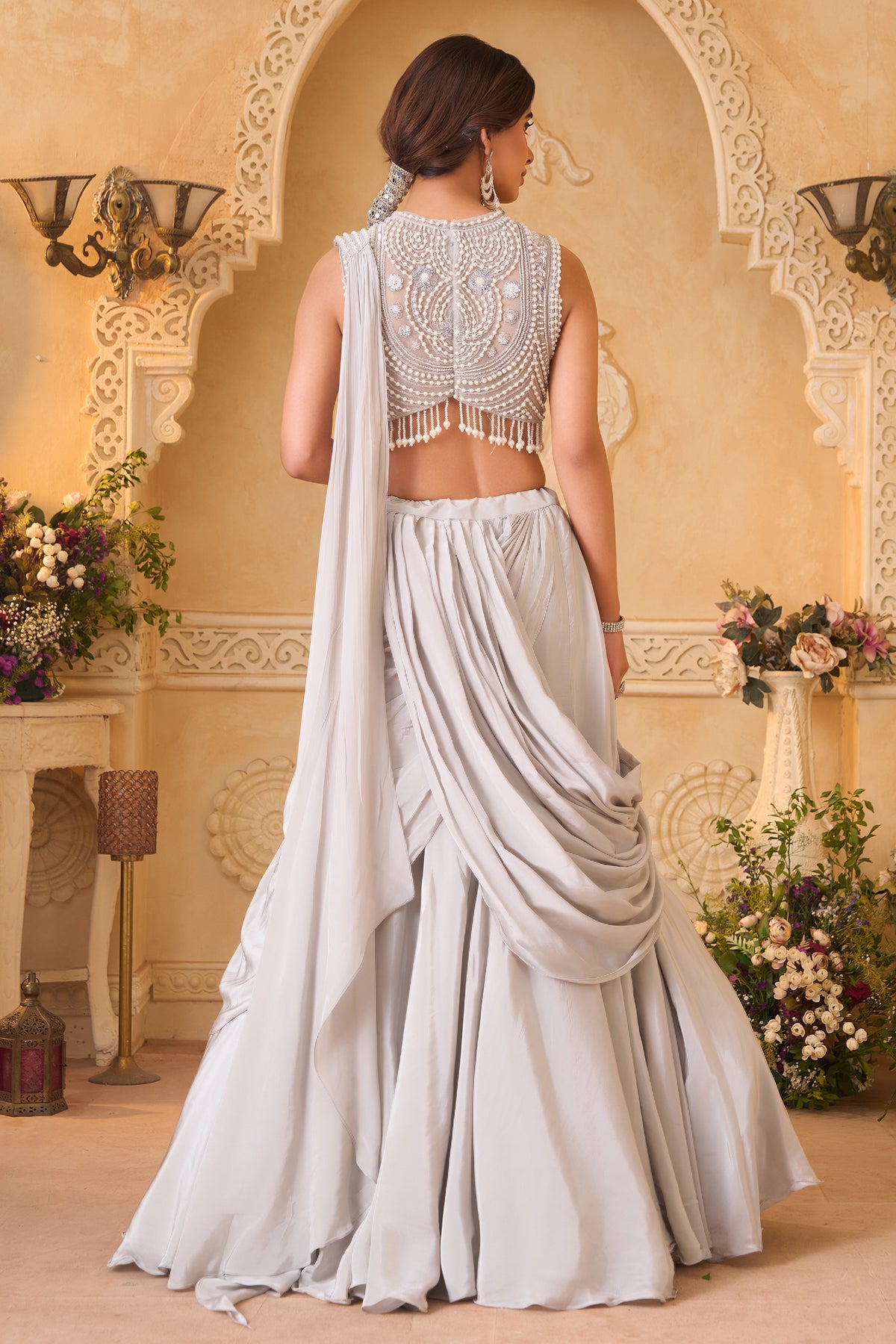 Ivory White Pre-Draped Lehenga featuring heavily Embroidered Pearl Fringe Blouse with Attached Dupatta