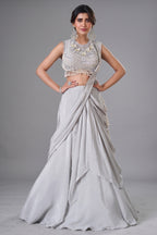 Ivory White Pre-Draped Lehenga featuring heavily Embroidered Pearl Fringe Blouse with Attached Dupatta