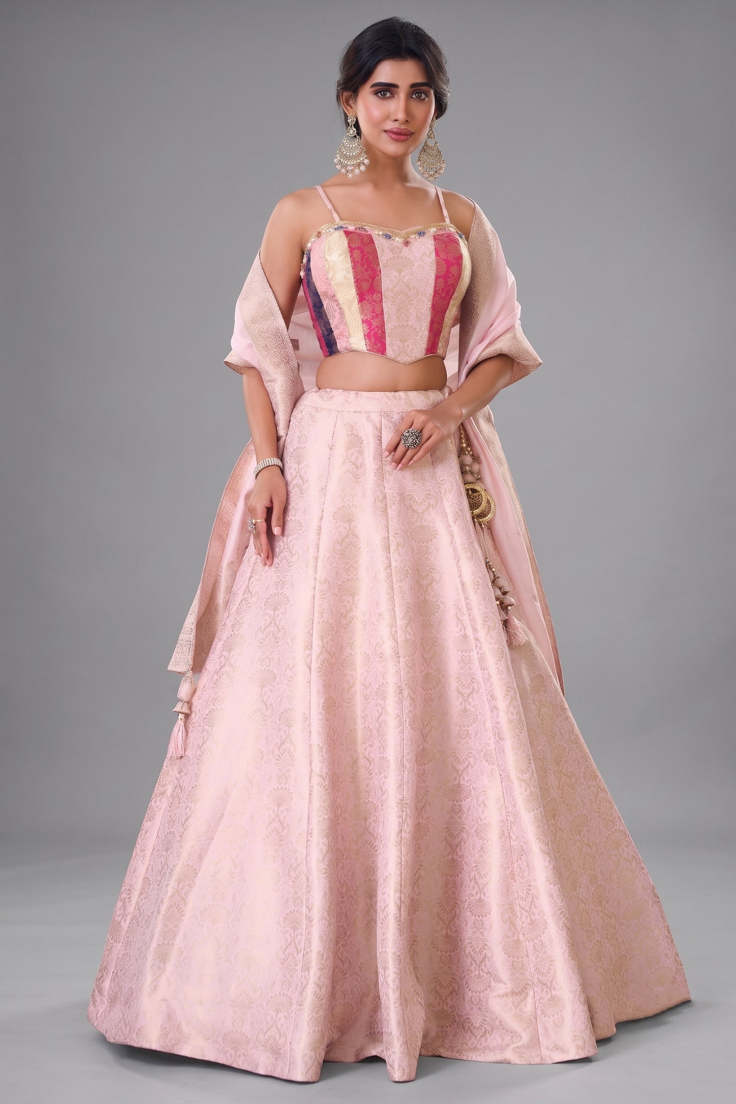 Pastel Pink Brocade Lehenga Set featuring Paneled Multi-Tonal Woven Corset and Banarasi Dupatta Main image